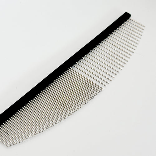 Close-up of 6.5 inch NorrGroom finishing dog comb showing fine and coarse teeth design


